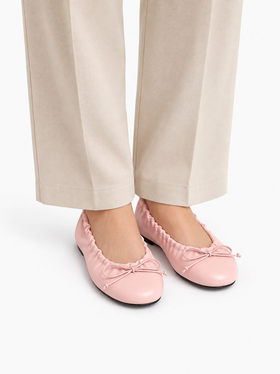 Mélanie-Rose – Babies en cuir souple à nœud femme – Rose — portée