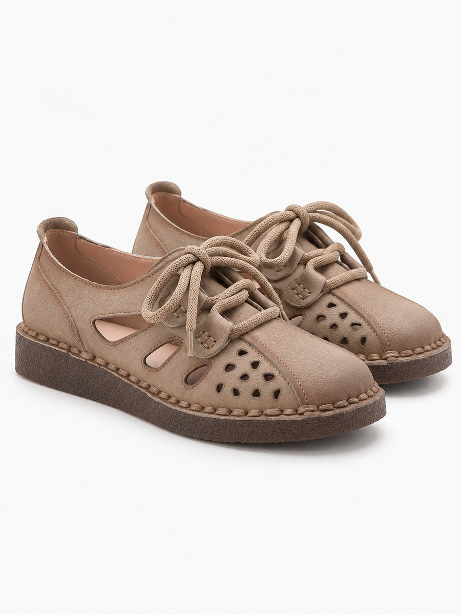Gisèle – Sandale compensée en cuir femme – Beige — paire vue trois-quarts
