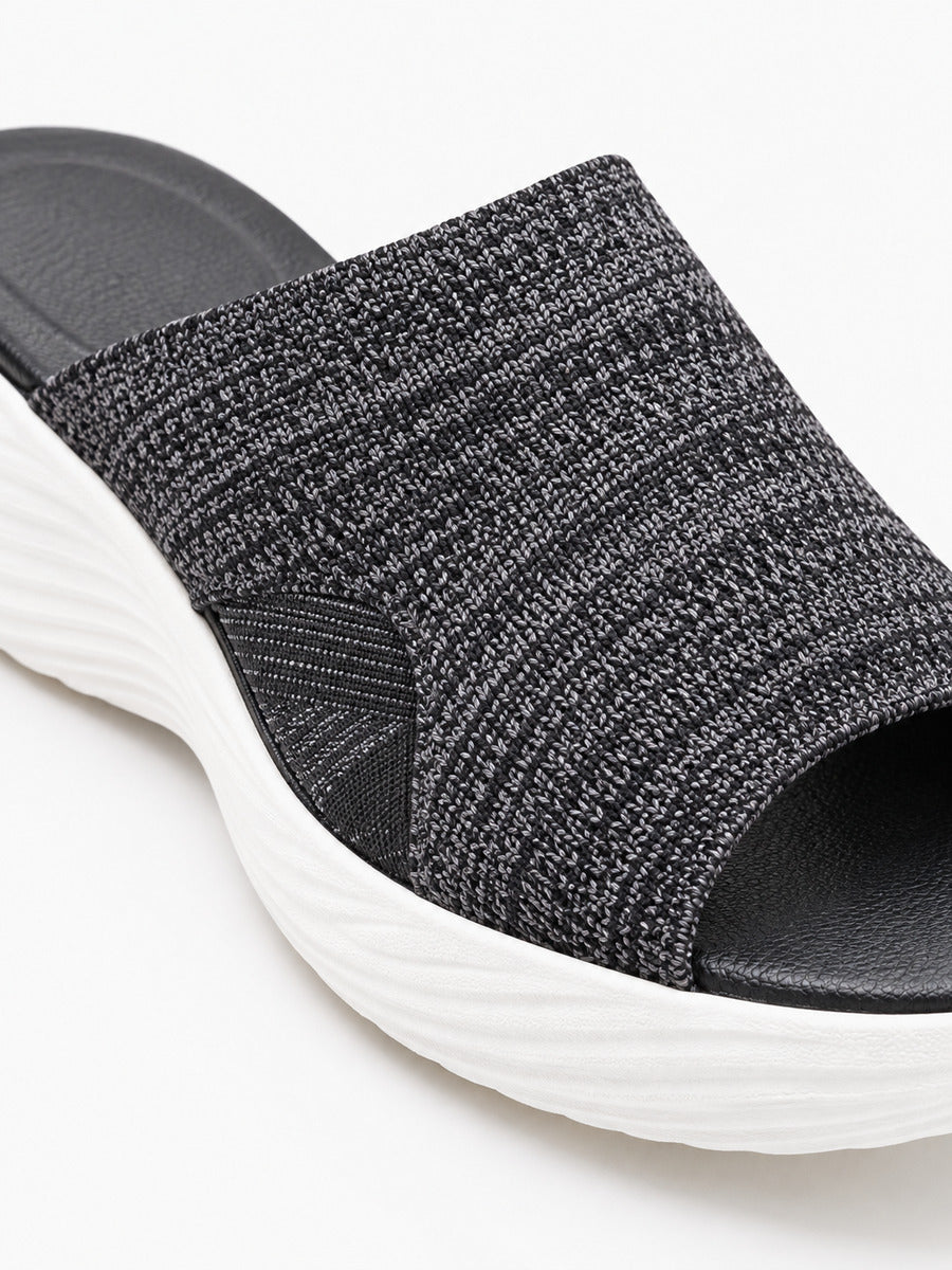 Léopoldine – Sandale élastique à talon bas femme – Noir — détail