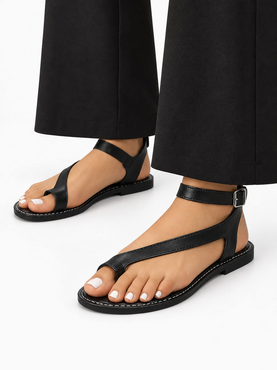 Saskia – Tong plate romaine femme – Noir — portée